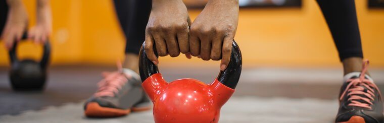 lady holding kettlebell